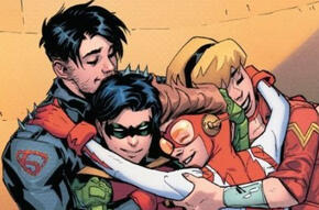 Superboy, Robin, Impulse, and Wondergirl hugging.